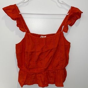 Orangey red. Purchased from Nordstrom